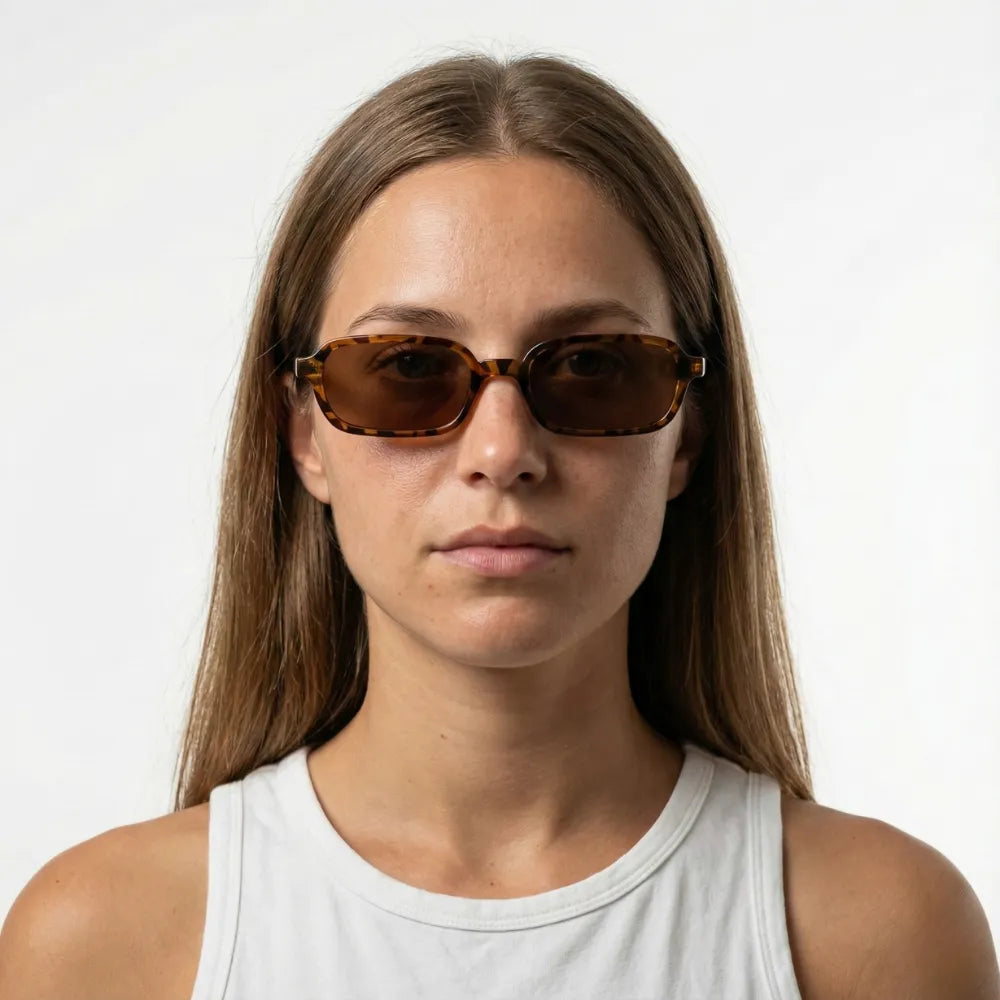 Narrow rectangular sunglasses by HARO Eyewear — Amalfi Sails editorial