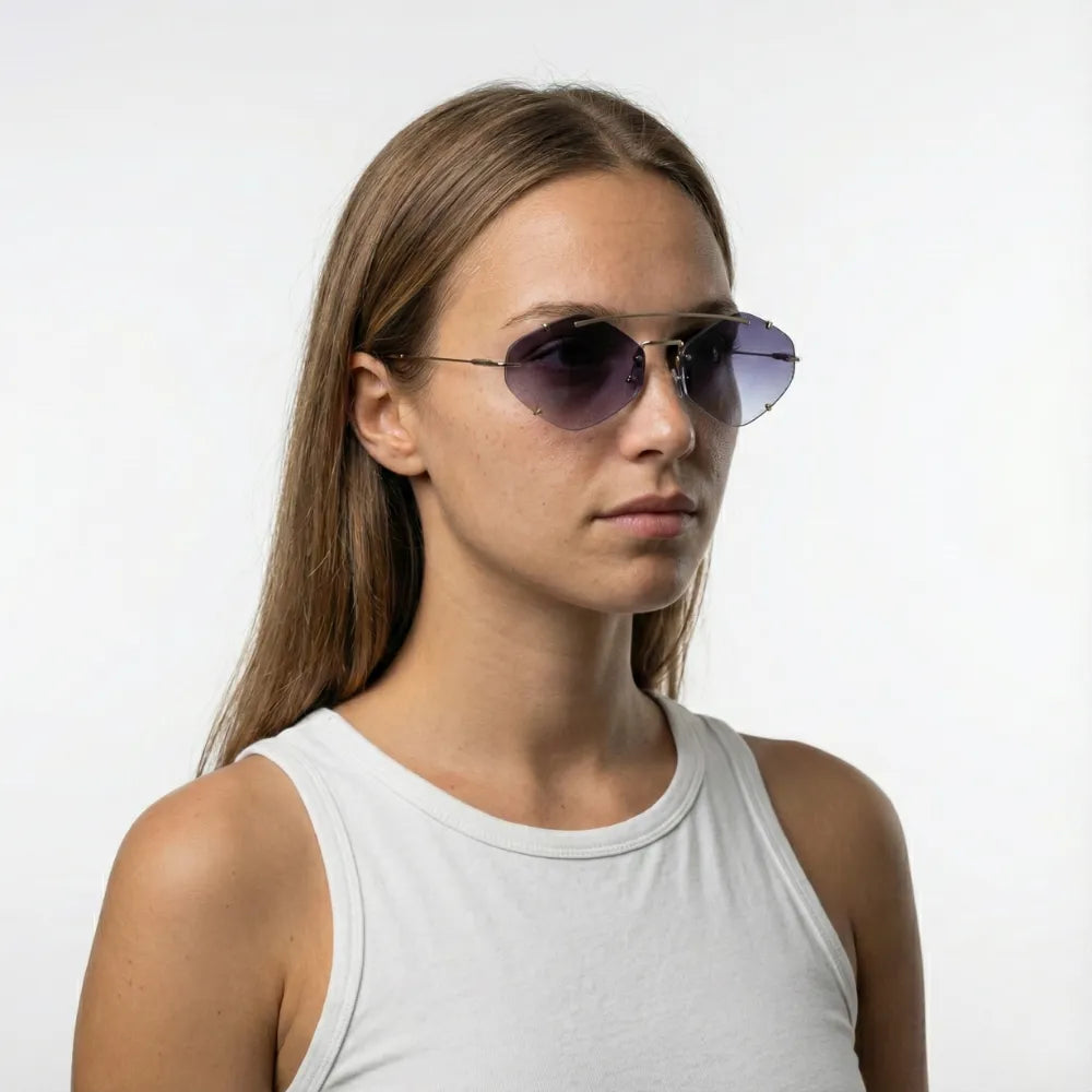 Minimal round sunglasses, model portrait — HARO Cap d'Antibes