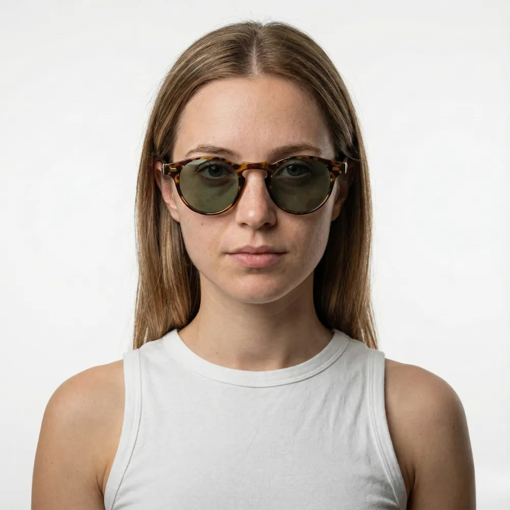 Translucent round acetate sunglasses by HARO Eyewear — Côte d'Azur Èze editorial