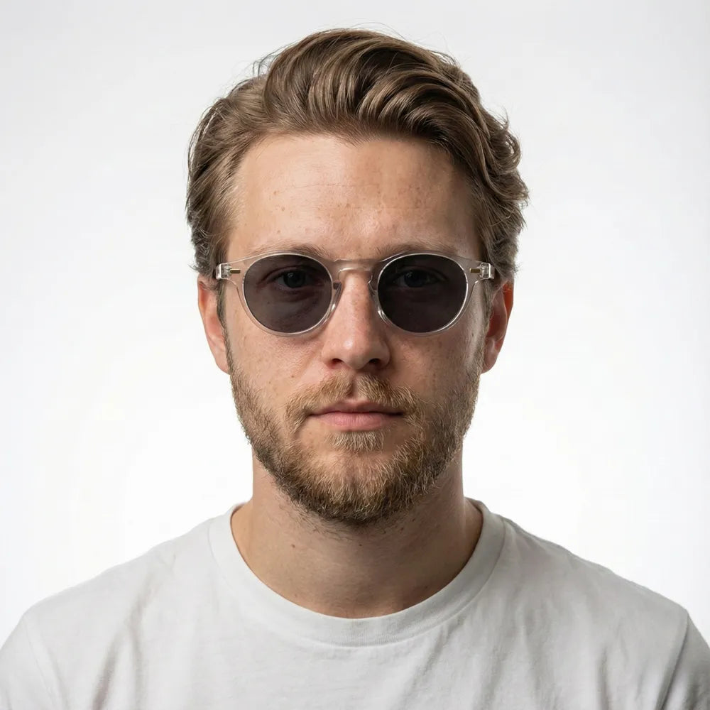 Translucent round acetate sunglasses worn outdoors — HARO Côte d'Azur Èze lifestyle