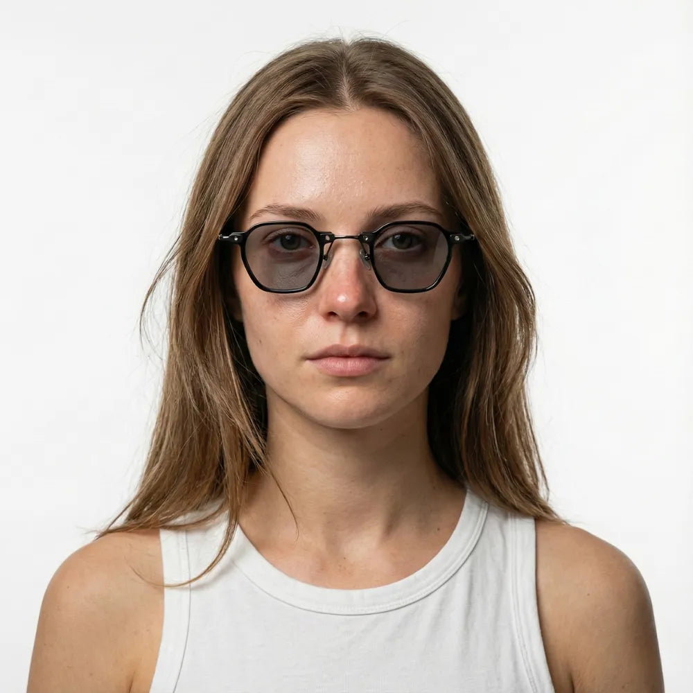 Small hexagonal metal sunglasses by HARO Eyewear — Porto Cervo editorial