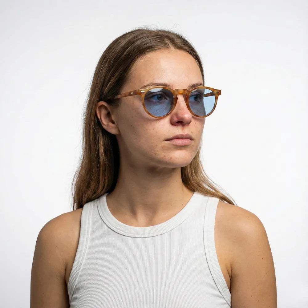 Round acetate sunglasses, model portrait — HARO Ravello Infinity